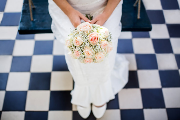 Bruidsboeket met een speciale weddingroos en gipskruid Bruidsboeket met een speciale weddingroos en gipskruid